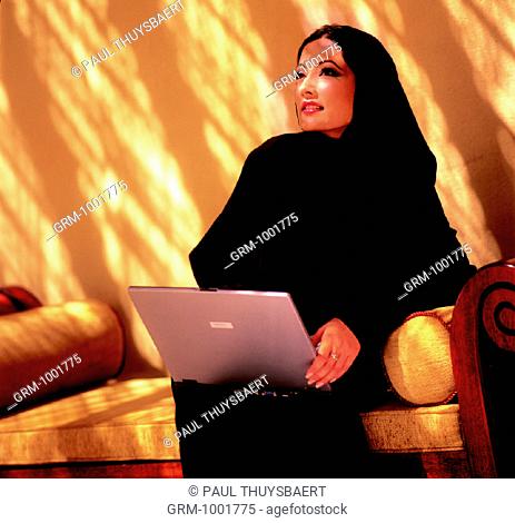 Arab woman using a laptop