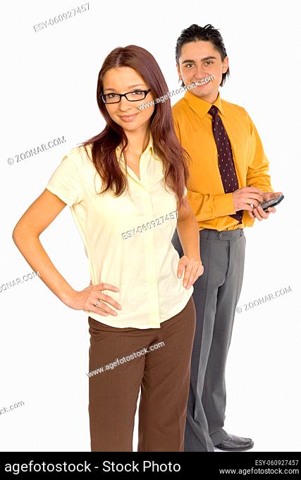 Formalwear man and woman standing on the white background in studio. Both looking at camera. Focus on first person's eyes