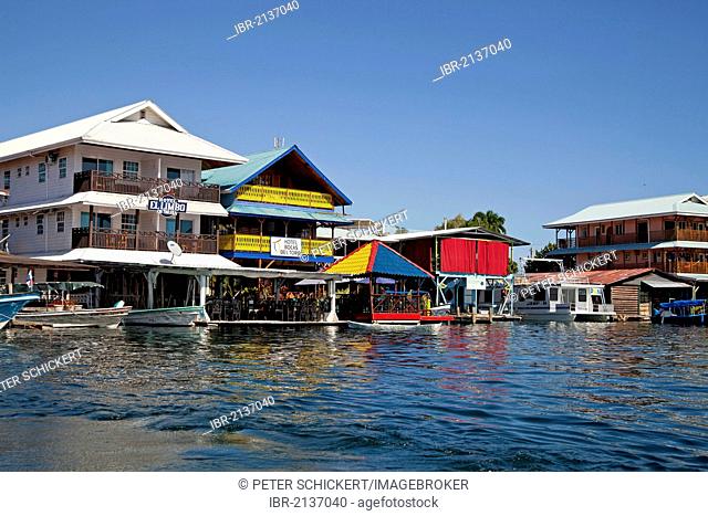 Typical wooden homes on stilts in Bocas del Toro, main town of the Bocas del Toro Caribbean archipelago, Panama, Central America