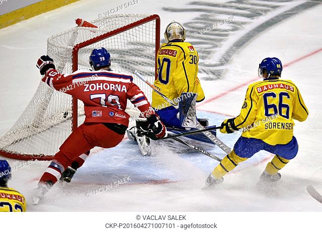 Tomas Zohorna (CZE), left, scores against goalkeeper Viktor Fasth, as Marcus Sorensen looks on (both SWE) in action during the Euro Hockey Tour series match...