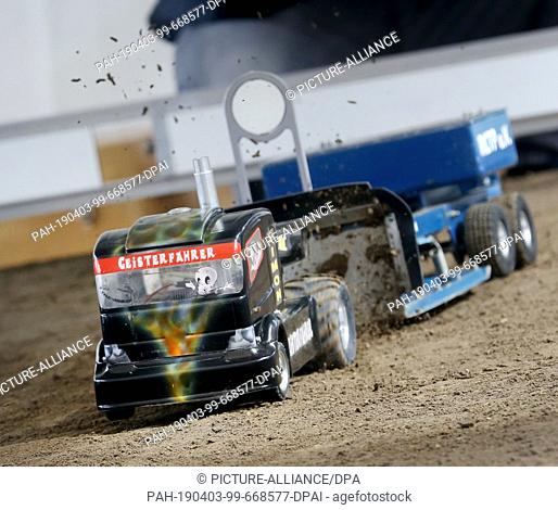 03 April 2019, North Rhine-Westphalia, Dortmund: The micropulling truck ""Geisterfahrer"" is throwing up a lot of dirt during the preview of the world's largest...