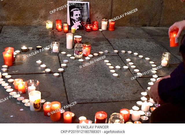 People light candles for Vaclav Havel in Ceske Budejovice, Czech Republic, on the eighth anniversary of his death on December 18, 2019