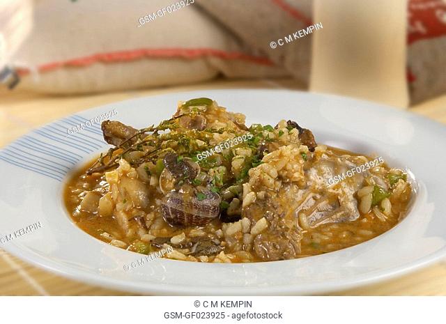 Rabbit with snails and rice