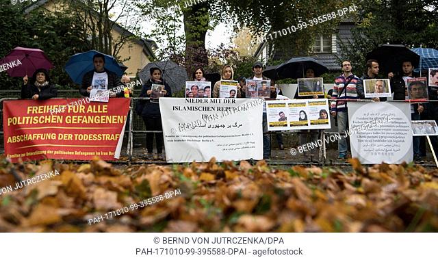 A small group of demonstrators protest against the execution of political prisoners in Iran in front of the nation's embassy in Berlin, Germany, 10 October 2017