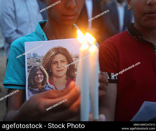 Gaza City, Palestine. 11th May 2022. Members and families of the Palestinian Journalists Syndicate take part in a protest in Gaza City to denounce the killing...
