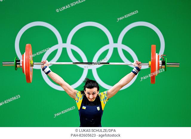 Veronika Ivasiuk of Ukraine competes during the Women's 58kg Group B category of the Rio 2016 Olympic Games Weightlifting events at the Riocentro in Rio de...