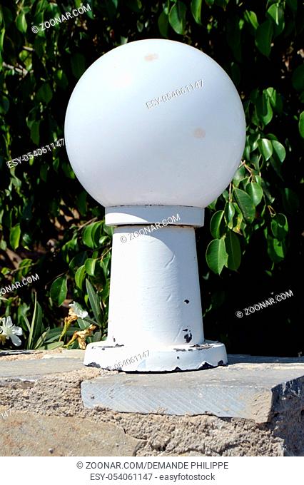 Lamp on foot with white ball for outside lighting
