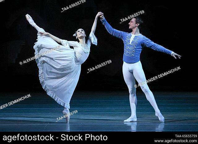 RUSSIA, ST PETERSBURG - DECEMBER 11, 2023: Mariinsky Ballet first soloists May Nagahisa as Princess Masha and Philipp Stepin as the Nutcracker Prince perform in...
