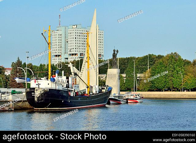 Kaliningrad, Russia - September 30, 2020: average fishing trawler stands on the roadstead of the world ocean Museum, Peter the Great embankment