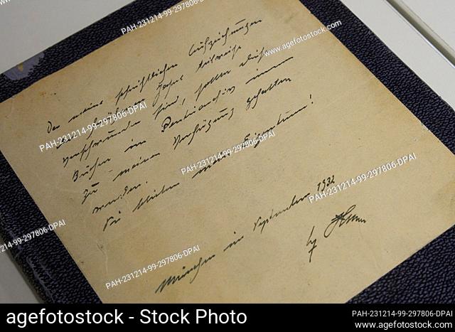 14 December 2023, Rhineland-Palatinate, Koblenz: The forged Hitler diaries are under a scanner in the Federal Archives in Koblenz
