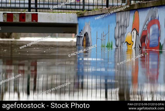 15 December 2023, Hesse, Eltville am Rhein: An underpass on the banks of the Rhine in Eltville is flooded. After rainfall and thaw