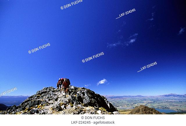 People on top of Mount Luxmoore in the Kepler Mountains, Fiordland National Park, South Island, New Zealand, Oceania