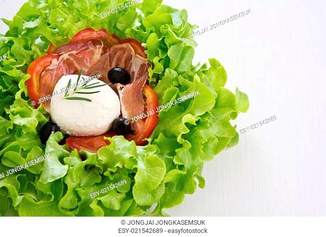 Mozzarella with Prosciutto and lettuce salad