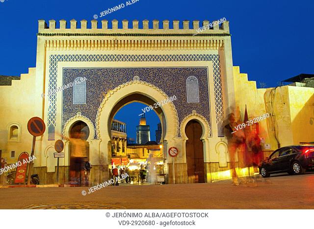 Street life scene. Bab Bou Jeloud gate, main entrance to Souk Medina of Fez, Fes el Bali. Morocco, Maghreb North Africa