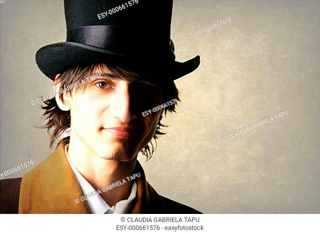 handsome gentlemen doorman with classic hat