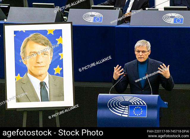 17 January 2022, France, Straßburg: Dacian Ciolo· (PLUS), leader of the Renew Europe group, stands in the European Parliament building and speaks during the...