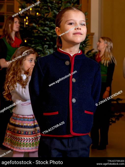 Queen Silvia was joined by her grandsons Prince Alexander, when they received and decorated the castle's Christmas trees from the Forest University student...