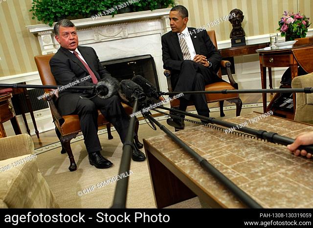 United States President Barack Obama (R) and King Abdullah II of Jordan deliver remarks to the news media after a meeting in the Oval Office at the White House...