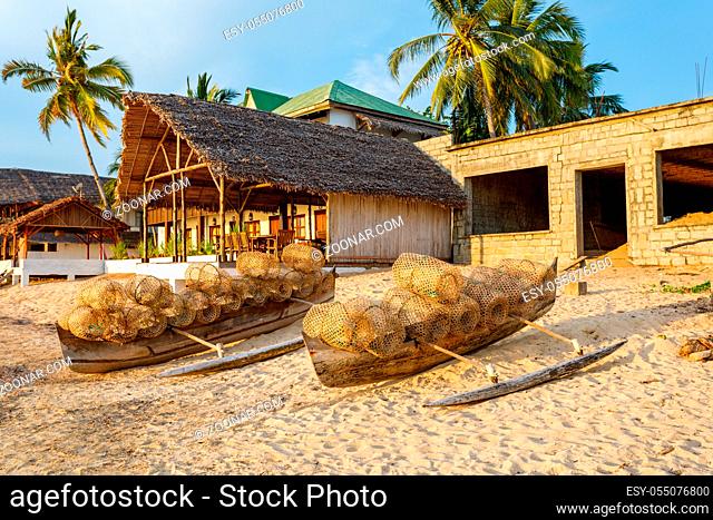 traditional malagasy bamboo woven crustacean fishing trap on beach in Nosy Be. Madagascar countryside scene