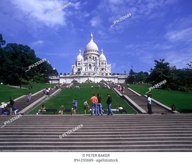 Sacre Coeur Church Basilica of the Sacred Heart at the summit of Montmartre Hill, the highest point in the city of Paris