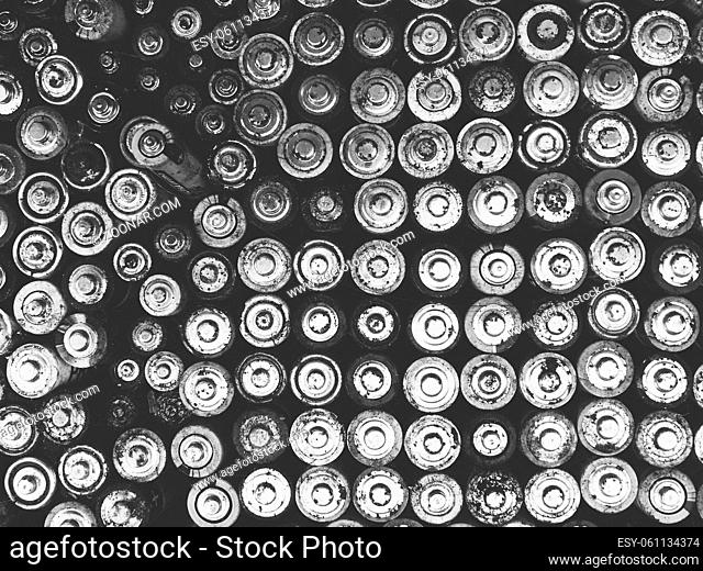 Old used batteries group. Top view background texture wallpaper. Black and white photography