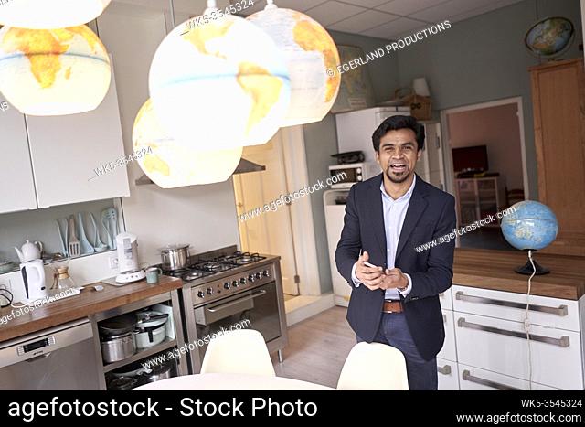 Indian business man in international home