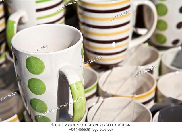 Close up of lots of coffee mugs