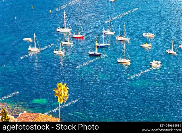Villefranche sur Mer idyllic French riviera bay sailing destination from above, Alpes-Maritimes region of France
