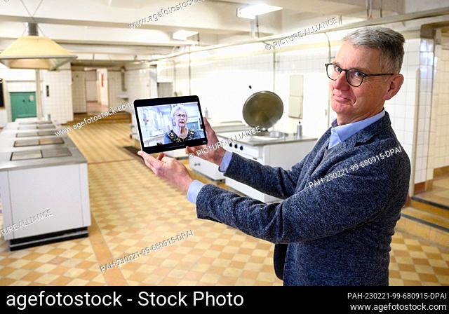 21 February 2023, Berlin: Helge Heidemeyer, director of the Hohenschönhausen Memorial, shows during a press tour before the opening of the new permanent...