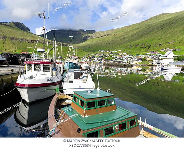 The harbour of the small town Fuglafjordur. The island Eysturoy one of the two large islands of the Faroe Islands in the North Atlantic