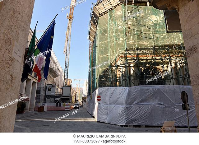 Buildings which were damaged as a result of an earthquake in April 2009 and are in the process of being restored, in L' Aquila, Italy, 25 August 2016