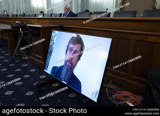 CEO of Twitter Jack Dorsey appears on a monitor as United States Senator Roger Wicker (Republican of Mississippi), Chairman, US Senate Committee on Commerce
