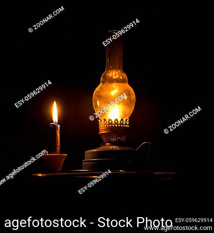 kerosene lamp and a candle