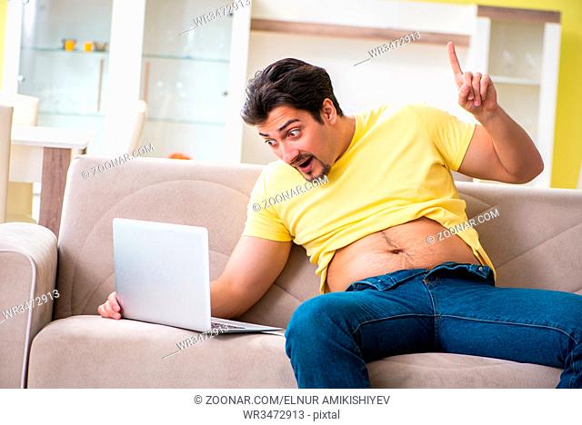 Man searching information in Internet in dieting concept
