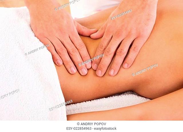 Client relaxing in massage parlor