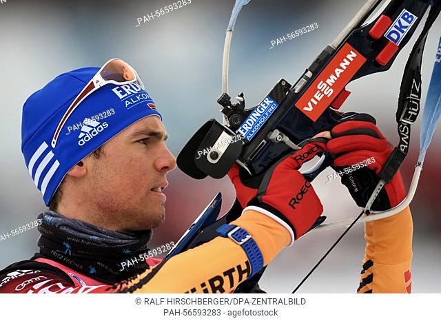 Biathlete Simon Schempp of Germany on the shooting range during zeroing before the 10km Sprint competition at the Biathlon World Championships in Kontiolahti