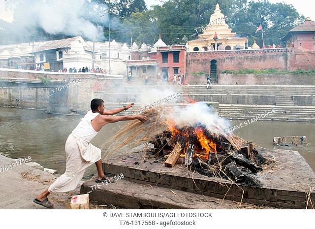 cremation ceremony on the Bagmati River at the Pahsupatinath Temple in Kathmandu, Nepal