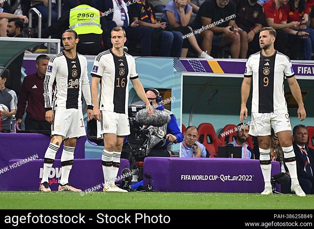 From left: Leroy SANE (GER), Lukas KLOSTERMANN (GER) and Niclas FUELLKRUG (GER) before the substitution. Spain (ESP) - Germany (GER) 1-1, Group stage Group E