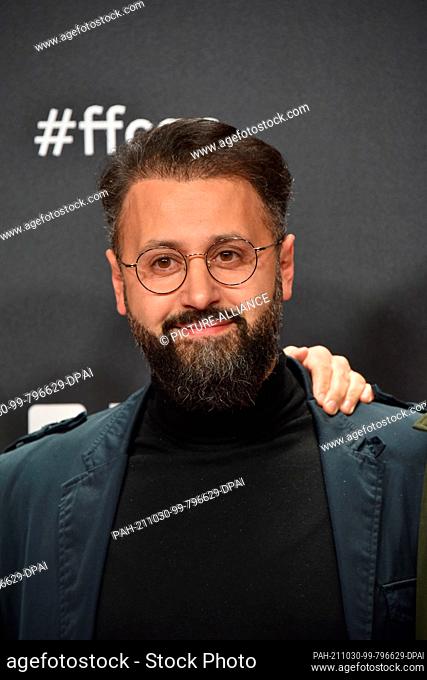 27 October 2021, North Rhine-Westphalia, Cologne: Actor Eddy Cheaib arrives for the screening of the film Westwall as part of the Film Festival Cologne