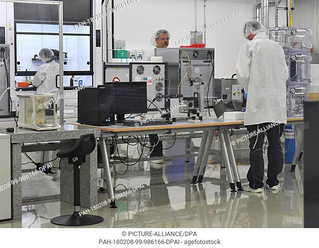 Research ingenious work in a clean room of Photovoltaics Germany GmbH in Brandenburg an der Havel, Germany, 8 February 2018