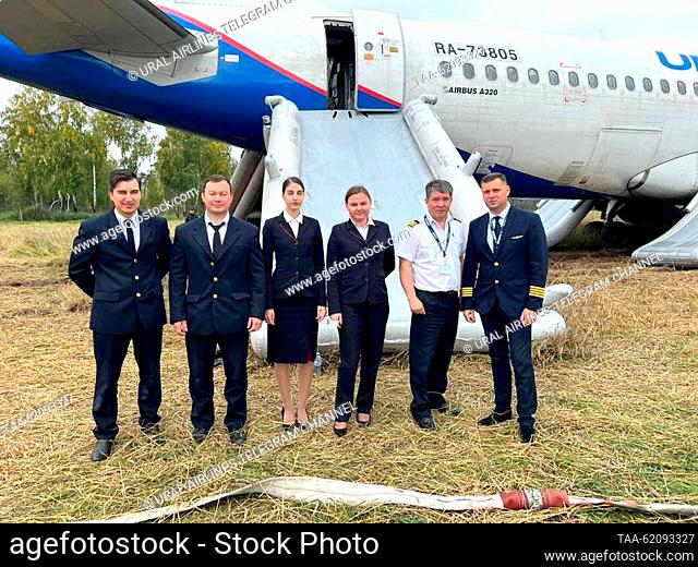 RUSSIA, NOVOSIBIRSK REGION - SEPTEMBER 12, 2023: The crew of an Ural Airlines aircraft that crash landed near the village of Ubinskoye