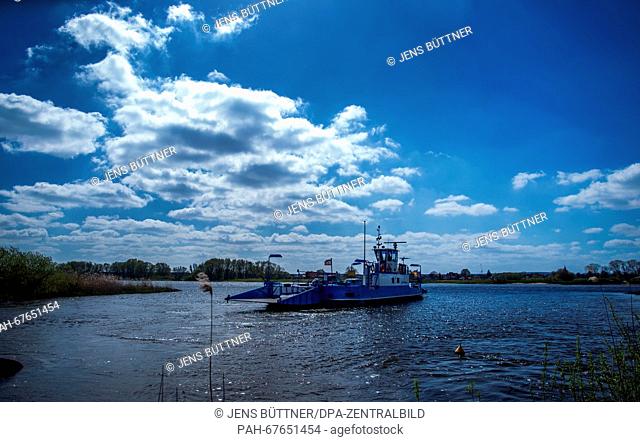The ferry 'Amt Neuhaus' makes its way along the Elbe river to the pier in Neu Bleckede, Germany, 20 April 2016. The vessel which is capable of carrying up to...