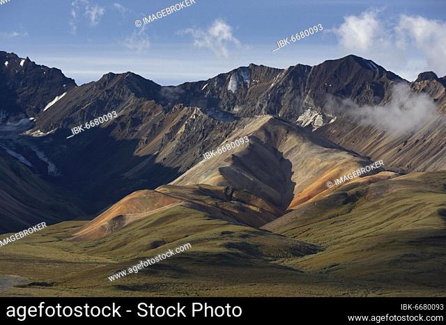 View of the Alaska Range with multicolored volcanic rock formations, Polychrome Pass, Denali National Park, Alaska, USA, North America