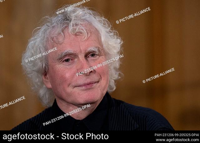 06 December 2023, Bavaria, Munich: Sir Simon Rattle, chief conductor of the Bavarian Radio Symphony Orchestra, is coming to the Bavarian Broadcasting...
