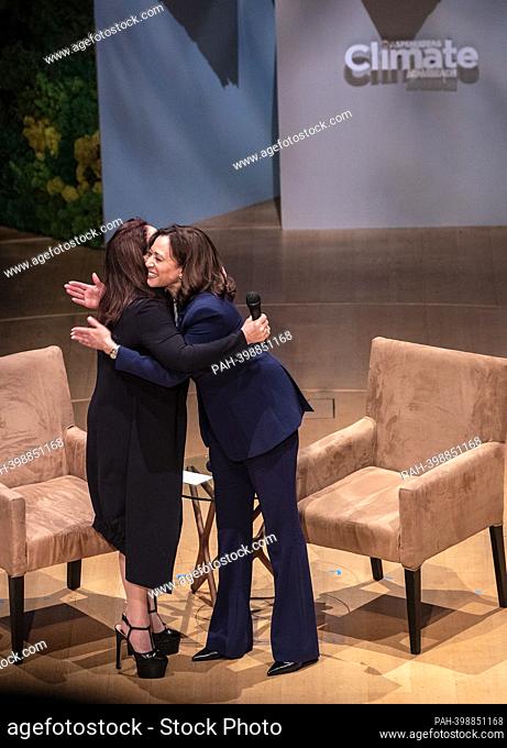 The United States Vice President Kamala Harris (R) salutes songwriter Gloria Estefan before a moderated conversation focused on 'the Biden-Harris...