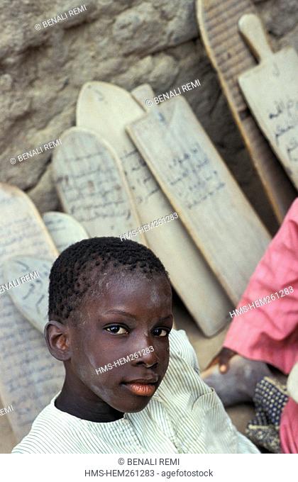 Mali, Mopti Region, Djenne, listed as World Heritage by UNESCO, student at a Koranic school