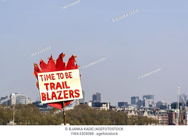 Extinction Rebellion protest on Waterloo Bridge, Time to be Trail Blazers placard, London, UK