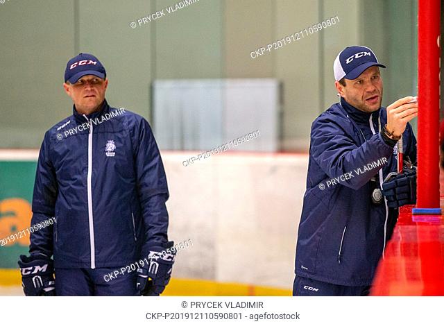 L-R Assistant Coach Ales Kratoska and Head Coach Vaclav Varada attend a training session of the Czech men's national under 20 ice hockey team prior to the U20...