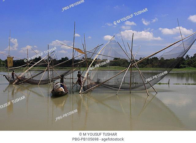 Fishing in the flooded water Manikganj, Bangladesh September 2008