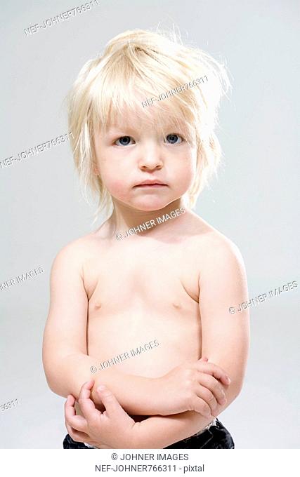 Portrait of a blond little boy
